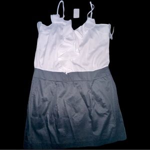 NWT dress size Large, solid white top, solid black bottom. Brand is Twenty One.